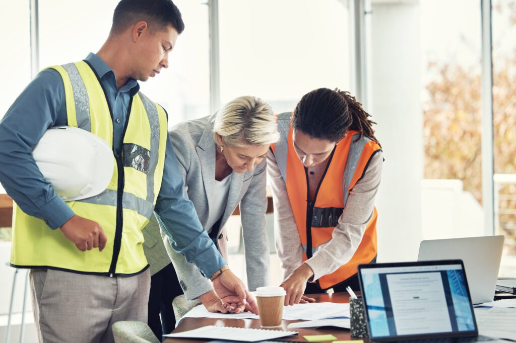 Professionals discussing project details