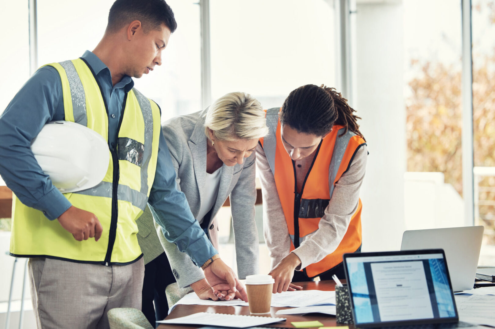 Professionals discussing project details