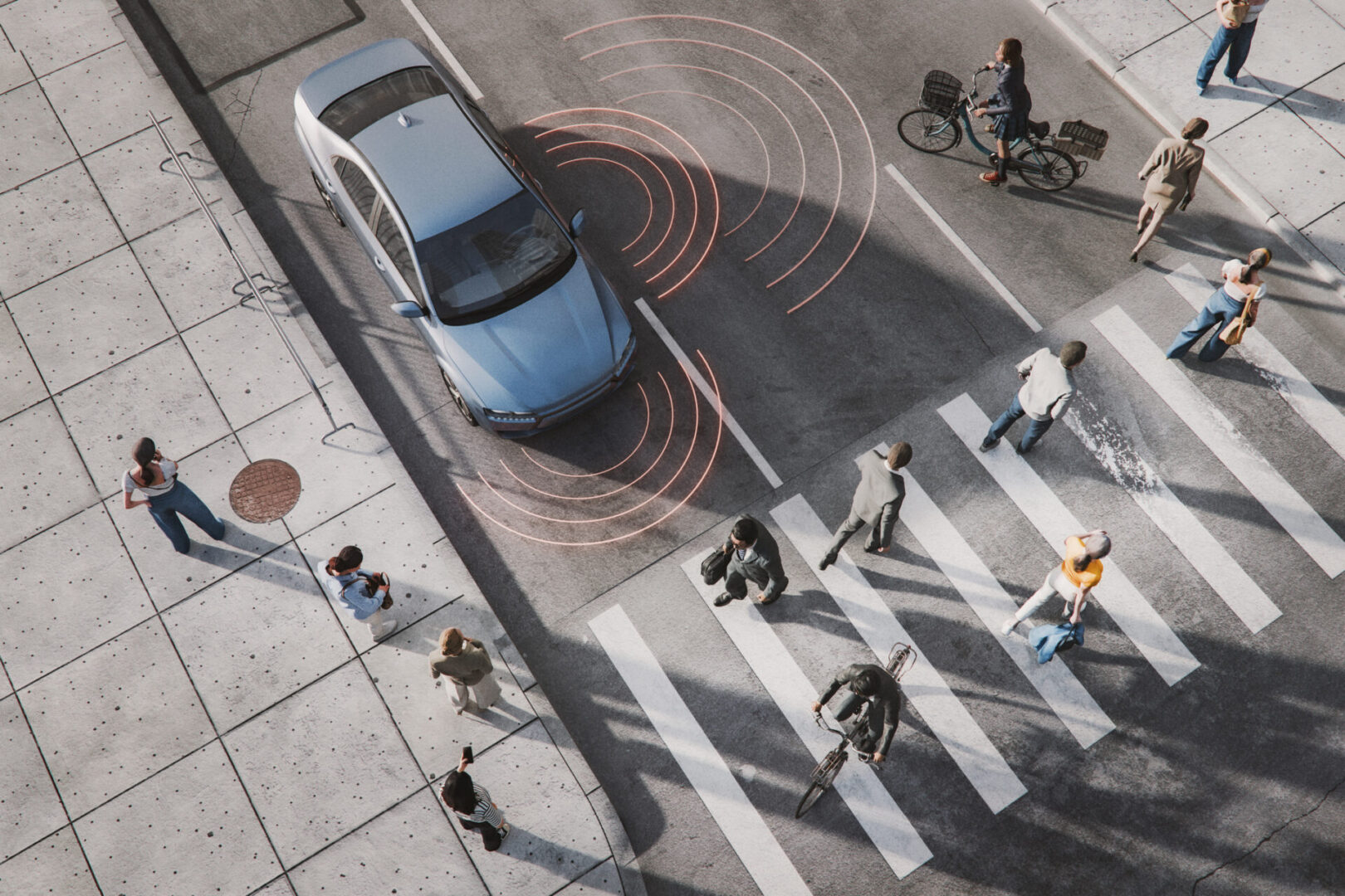Car sensing pedestrians at crosswalk intersection.
