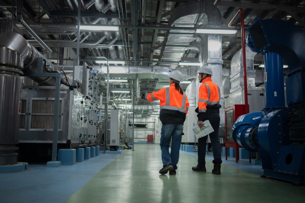 Engineers inspecting industrial facility